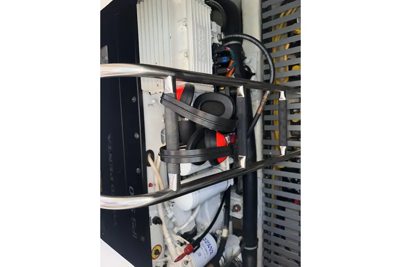 Slide: The Image of Engine compartment of 2018 Tiara Yachts C39 Coupe, showcasing mechanical components and wiring. - 34