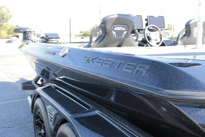 Slide: The Image of 2025 Skeeter FXR21 Limited boat, sleek design with modern features and branding. - 14