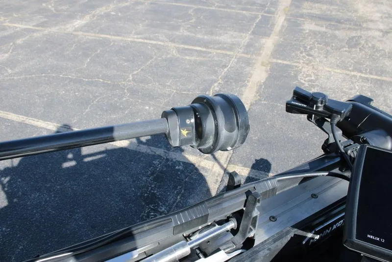 Slide: The Image of Close-up of 2025 Skeeter FXR21 Limited boat equipment on a paved surface. - 5