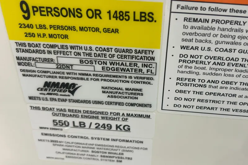 Slide: The Image of 2025 Boston Whaler 220 Dauntless capacity label, 9 persons or 1485 lbs, 250 HP motor. - 23