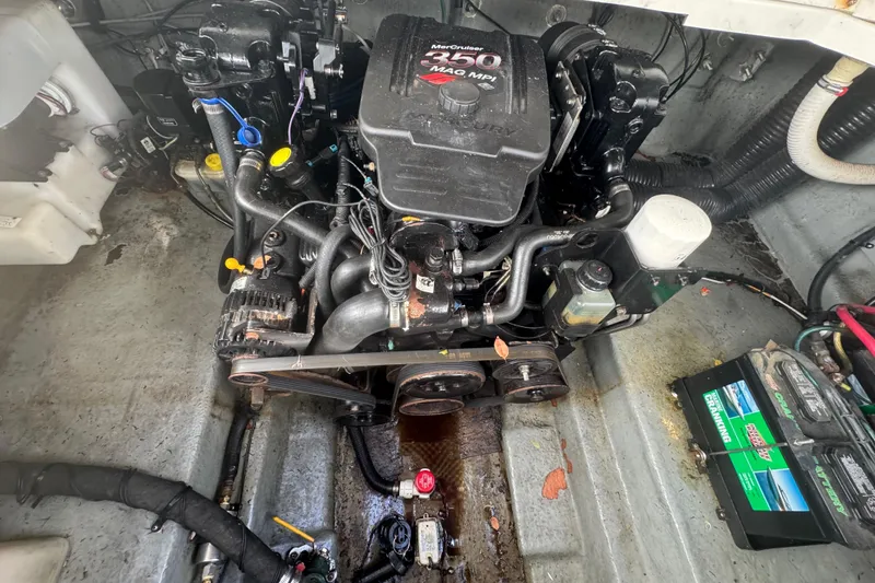 Slide: The Image of Engine compartment of a 2004 Sea Ray 260 Sundancer with MerCruiser 350 MAG MPI engine. - 9