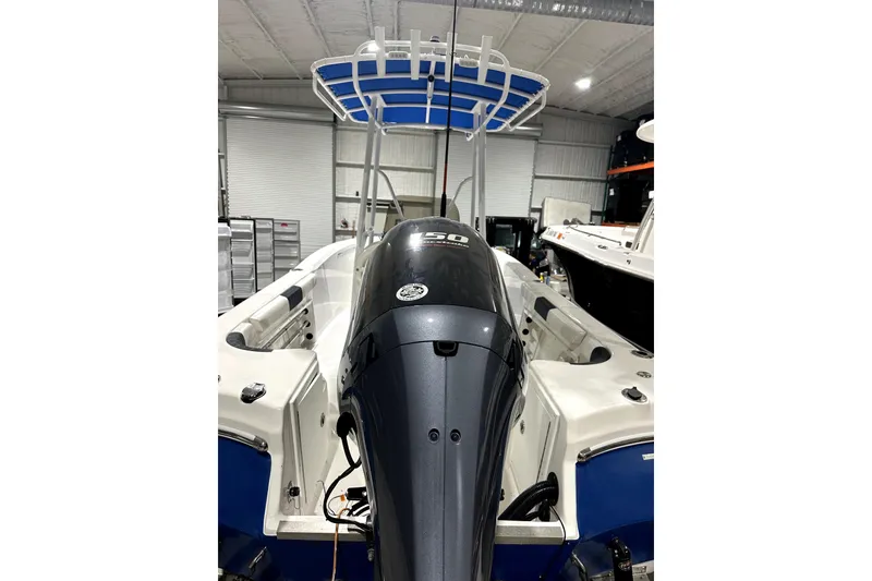 Slide: The Image of 2019 Polar 1 boat with 150 HP engine in a storage facility. - 4