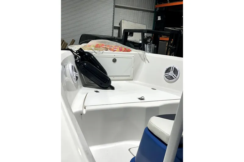 Slide: The Image of 2019 Polar 1 boat interior with speakers and storage compartment. - 6
