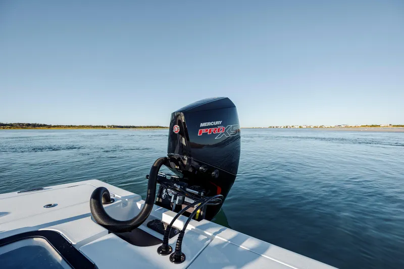 Slide: The Image of Vtech 18 boat with Mercury Pro XS engine on calm water, 2026 model. - 17