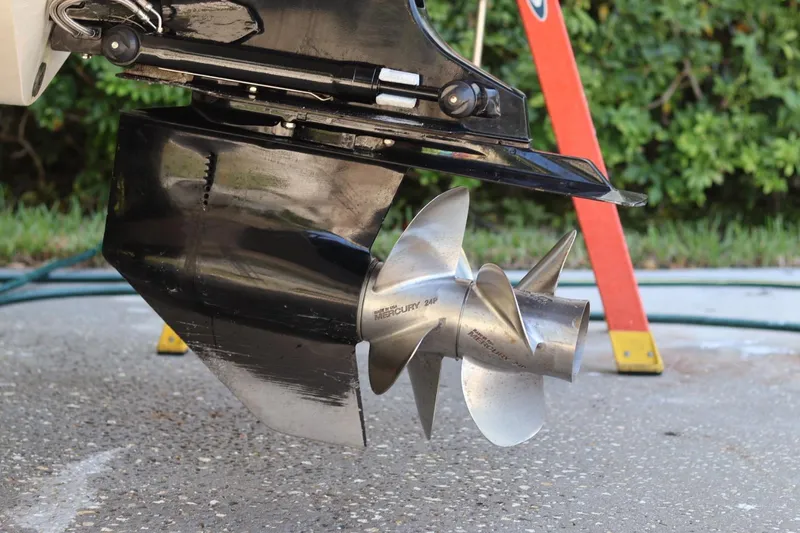 Slide: The Image of 2010 Monterey 254FS boat propeller, Mercury 24P, on a concrete surface. - 12