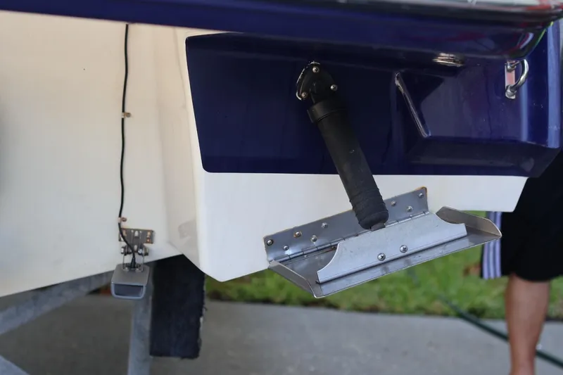 Slide: The Image of Rear view of a 2010 Monterey 254FS boat with trim tab and hardware. - 16