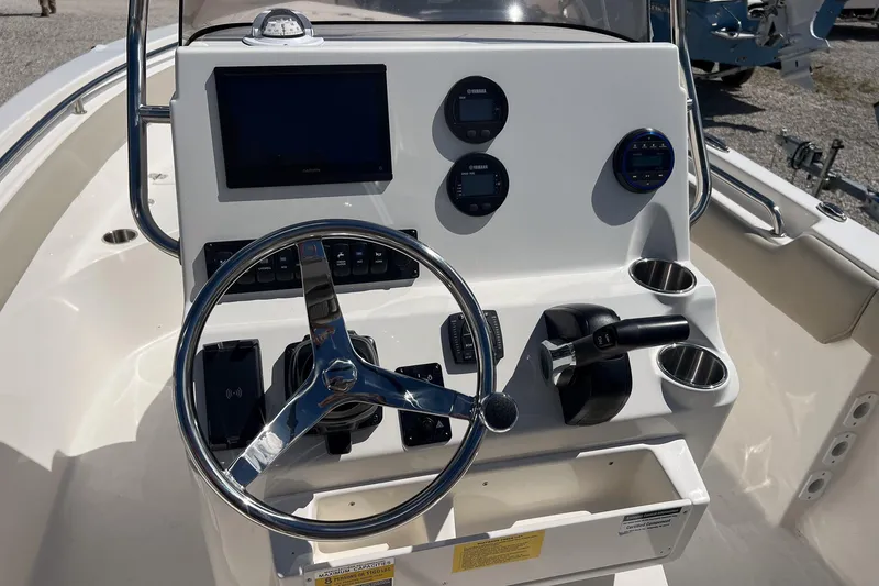 Slide: The Image of 2026 Key West 203 FS boat seat with gray upholstery and diamond stitching. - 8