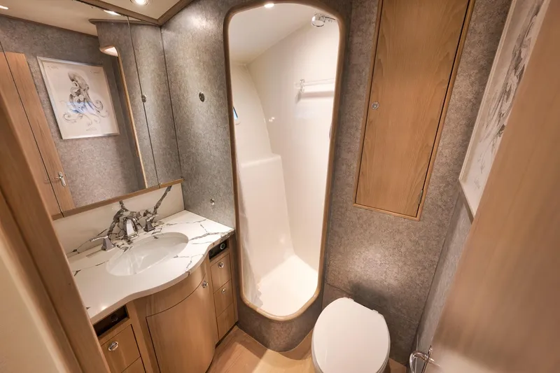Slide: The Image of Luxurious 1993 Merritt Sportfish bathroom with modern fixtures and elegant design. - 21