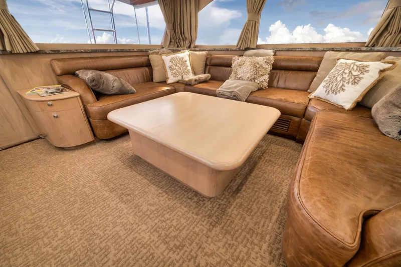 Slide: The Image of Luxurious 1993 Merritt Sportfish yacht interior with leather seating and elegant decor. - 34