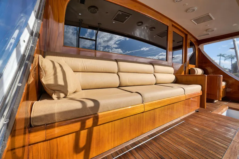 Slide: The Image of Luxurious 1993 Merritt Sportfish yacht interior with plush seating and wooden finishes. - 44