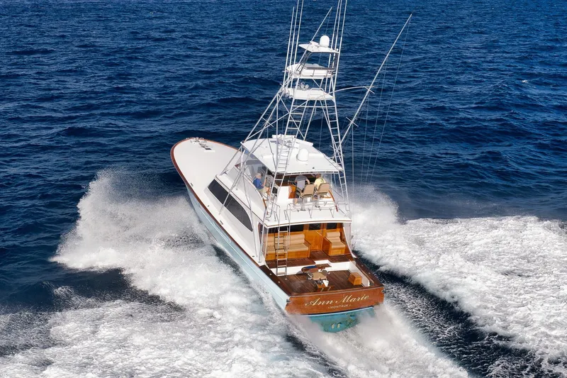 Slide: The Image of 1993 Merritt Sportfish yacht cruising on open ocean waters. - 7