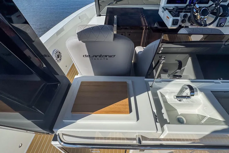 Slide: The Image of 2026 De Antonio Yachts D42 cockpit with luxurious seating and modern helm controls. - 16