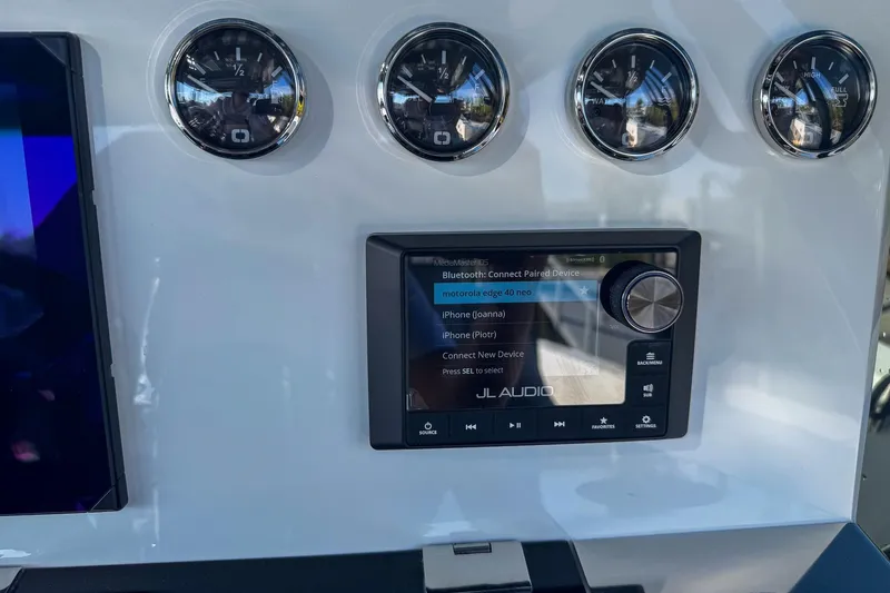 Slide: The Image of Control panel of 2026 De Antonio Yachts D42 with JL Audio system and gauges. - 28