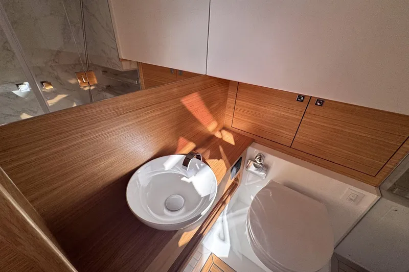 Slide: The Image of Luxurious bathroom interior of 2026 De Antonio Yachts D42 with modern wood finish. - 37