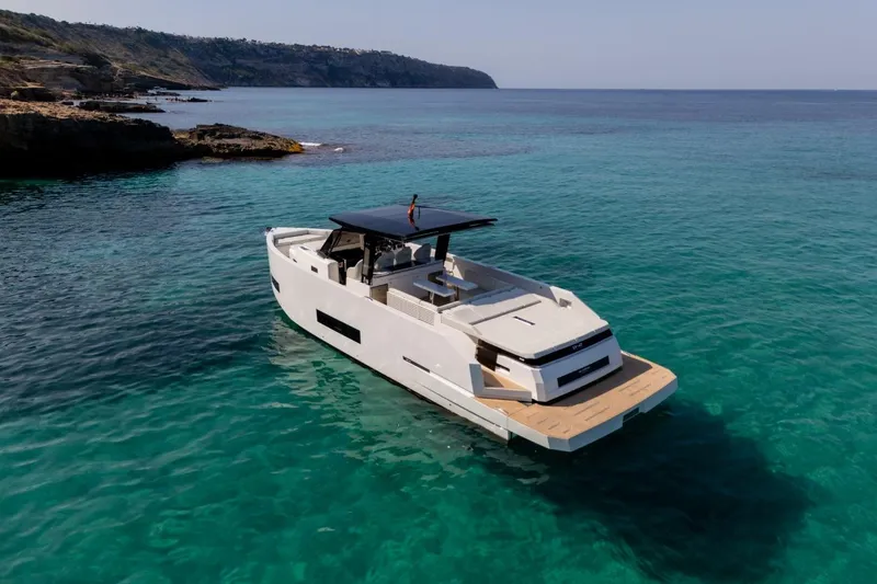 Slide: The Image of Triple outboard engines on 2026 De Antonio Yachts D42, open engine compartment. - 7