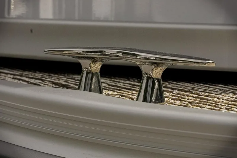 Slide: The Image of Close-up of a cleat on a 2026 SunCatcher Select 22RC boat. - 12