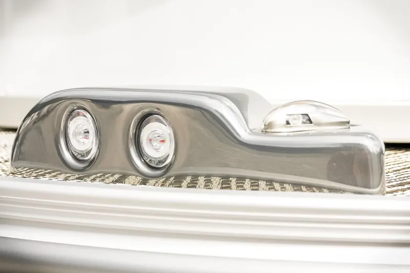 Slide: The Image of Close-up of 2026 SunCatcher Select 22RC boat's sleek metallic light fixture. - 14