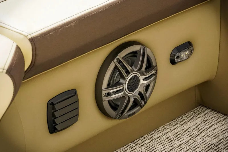 Slide: The Image of Speaker and vent detail on 2026 SunCatcher Select 22RC boat interior. - 17