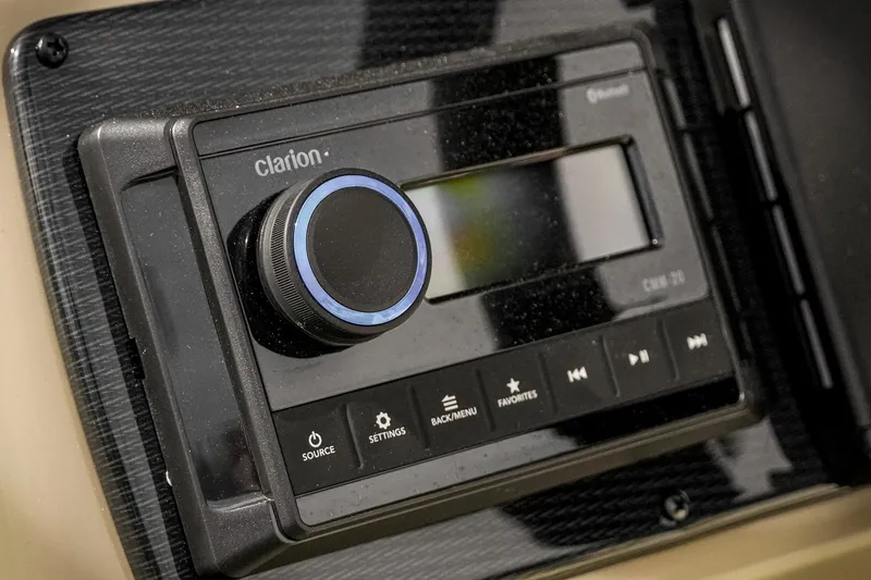 Slide: The Image of Clarion audio system in 2026 SunCatcher Select 22RC boat, featuring Bluetooth connectivity. - 19