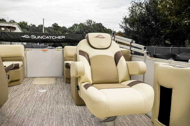 Slide: The Image of Luxurious seating on 2026 SunCatcher Select 22RC pontoon boat, featuring plush beige upholstery. - 24