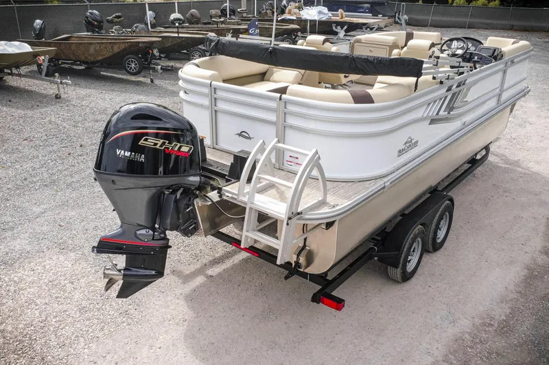Slide: The Image of 2026 SunCatcher Select 22RC pontoon boat with Yamaha engine on trailer. - 34