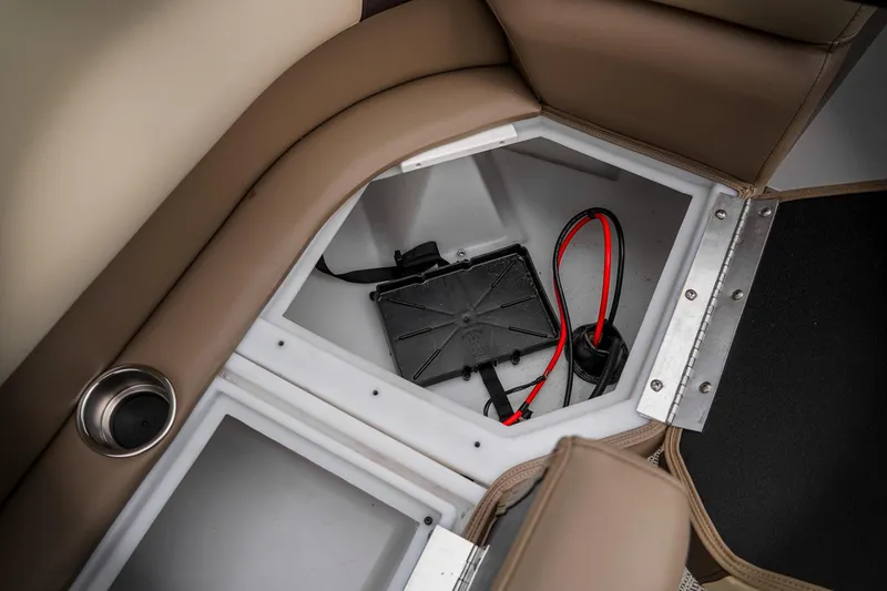 Slide: The Image of Storage compartment in 2026 SunCatcher Select 22RC boat with battery and wiring. - 36