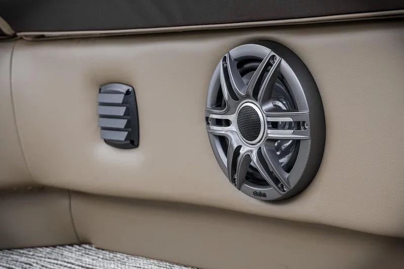 Slide: The Image of Speaker and vent detail on 2026 SunCatcher Select 22RC boat interior. - 44