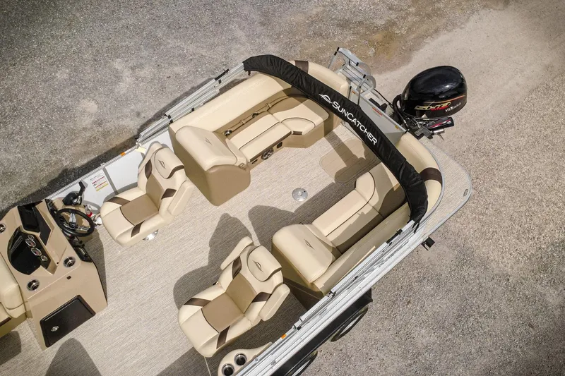 Slide: The Image of 2026 SunCatcher Select 22RC pontoon boat with beige seating and Yamaha outboard motor. - 7
