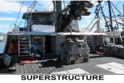 Slide: The Image of Custom Longliner 58 fishing boat superstructure, 1979 model, docked with equipment visible. - 11