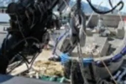 Slide: The Image of 1979 Custom Longliner 58 fishing boat deck with equipment and ropes. - 14