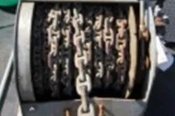 Slide: The Image of Close-up of a winch mechanism on a 1979 Custom Longliner 58 boat. - 18