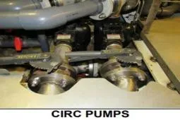 Slide: The Image of 1979 Custom Longliner 58 circulation pumps in engine room. - 19