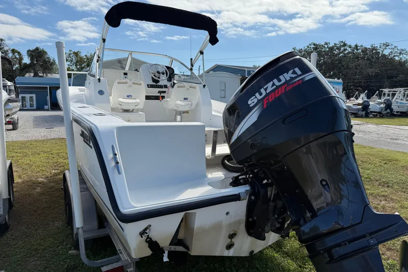 Slide: The Image of 2005 Mako 215 Walk Around boat with Suzuki Four Stroke engine on trailer. - 4