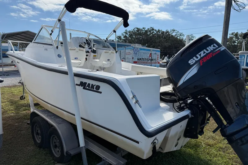 Slide: The Image of 2005 Mako 215 Walk Around boat with Suzuki Four Stroke engine on trailer. - 5