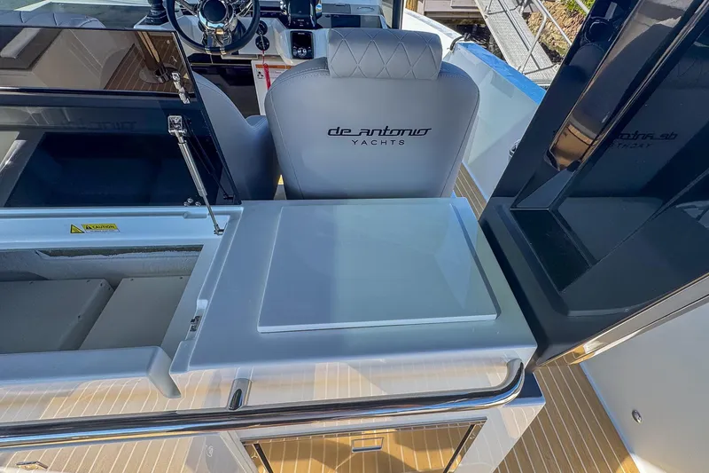Slide: The Image of 2026 De Antonio Yachts D42 cockpit with modern helm and seating area. - 17