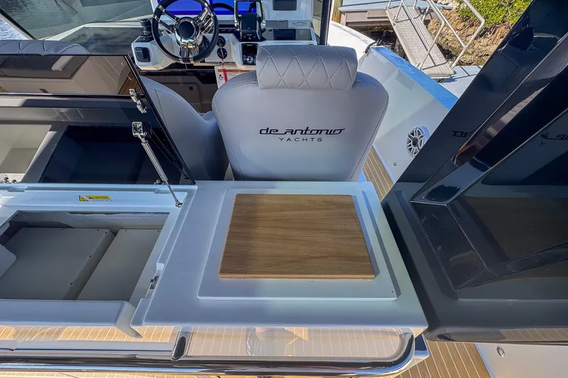 Slide: The Image of 2026 De Antonio Yachts D42 helm with luxurious seating and modern controls. - 19