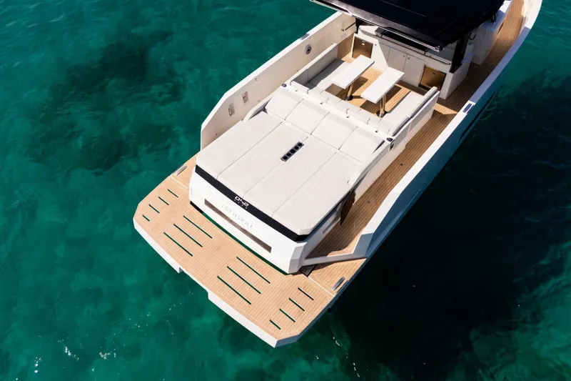 Slide: The Image of 2026 De Antonio Yachts D42 luxury yacht with spacious deck and modern design. - 9