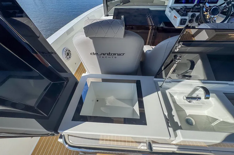 Slide: The Image of 2026 De Antonio Yachts D42 interior with sink and seating, showcasing luxury design. - 15