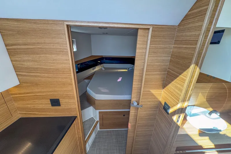Slide: The Image of Luxurious interior cabin of 2026 De Antonio Yachts D42 with modern wood finish. - 32