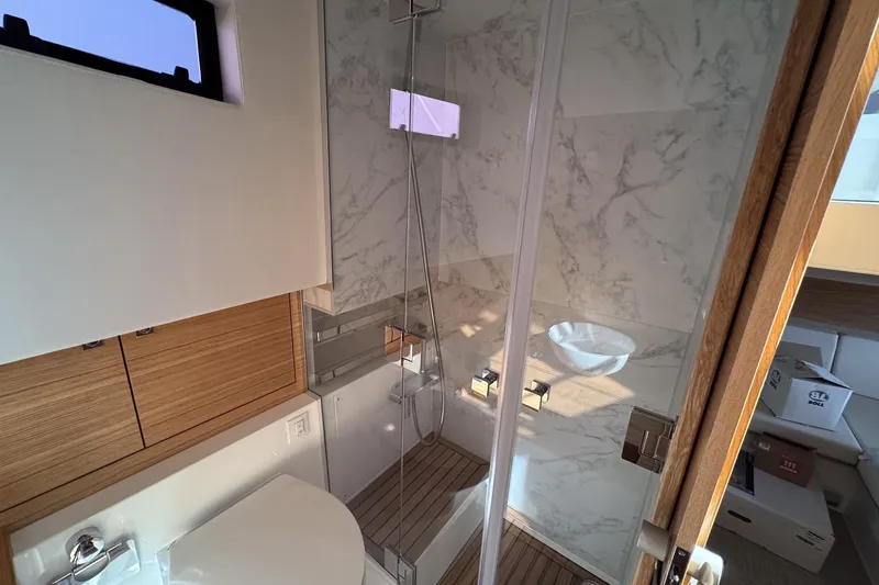 Slide: The Image of Luxurious bathroom interior of 2026 De Antonio Yachts D42 with modern fixtures and wood accents. - 36