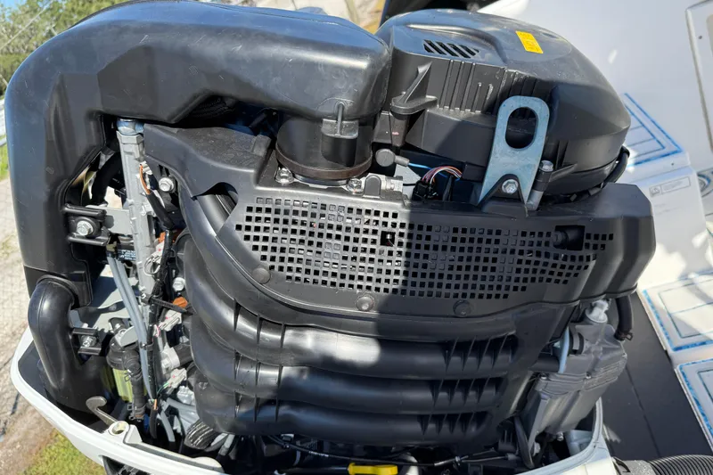 Slide: The Image of Outboard motor of a 1997 Hydra-Sports 2000 CC boat, detailed view. - 12