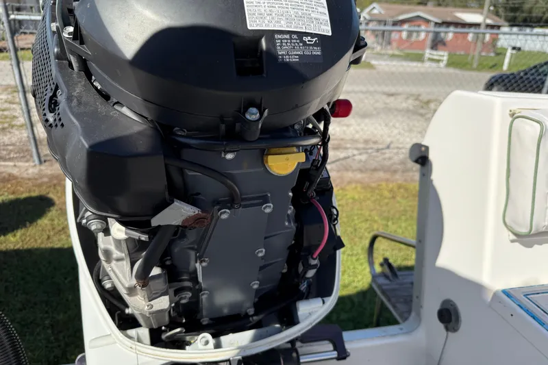 Slide: The Image of 1997 Hydra-Sports 2000 CC boat engine close-up, showcasing mechanical details. - 13