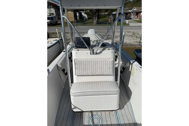 Slide: The Image of 1997 Hydra-Sports 2000 CC boat interior with seating and console. - 3