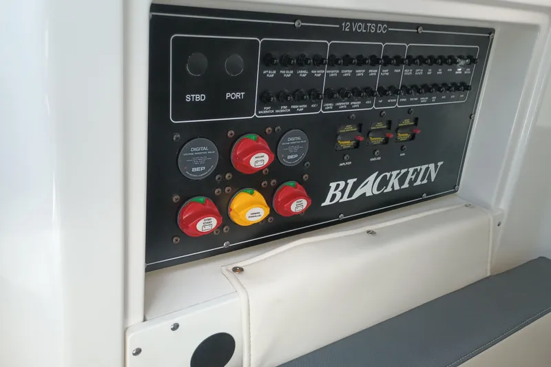 Slide: The Image of Control panel of 2020 Blackfin 272 CC boat with switches and dials. - 36