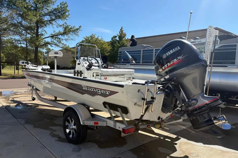 The Image of 2017 Ranger RB190 Bay boat with Yamaha outboard motor on a trailer. - 1