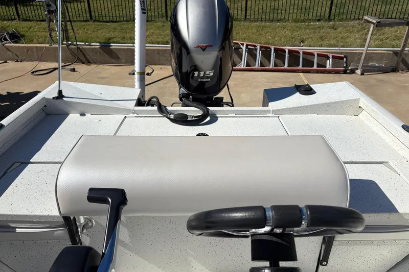 Slide: The Image of 2017 Ranger RB190 Bay boat with Yamaha 115 engine, featuring a sleek white interior. - 6