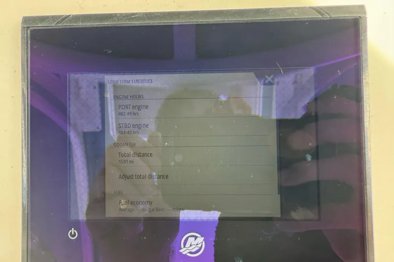 Slide: The Image of Display screen showing engine statistics for 2021 Sea Cat 260 boat. - 17