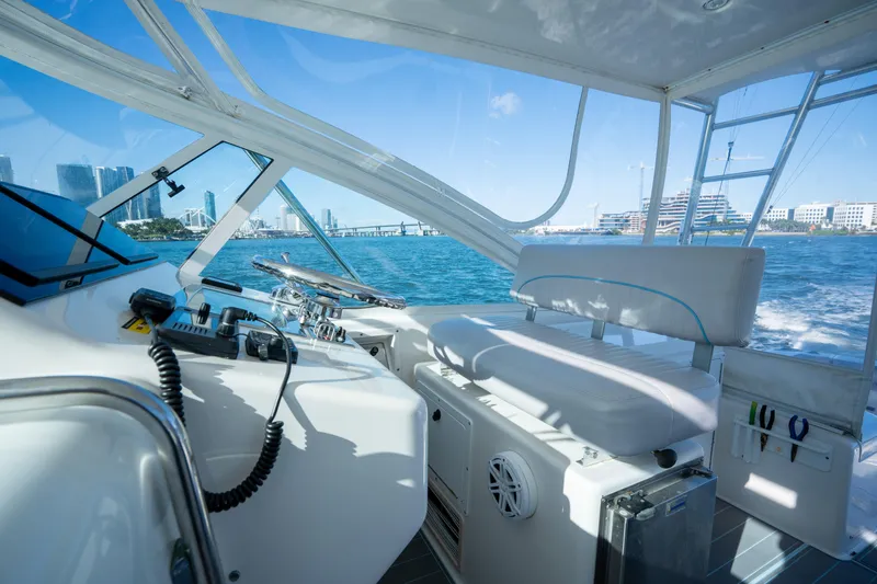 Slide: The Image of 2004 Cabo 35 Express boat interior with city skyline and ocean view. - 14