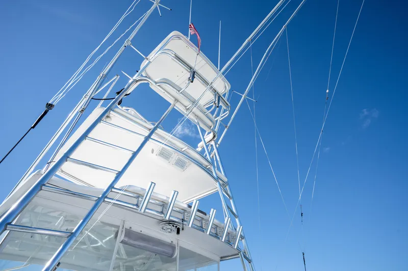 Slide: The Image of Tower of 2004 Cabo 35 Express boat against clear blue sky. - 26