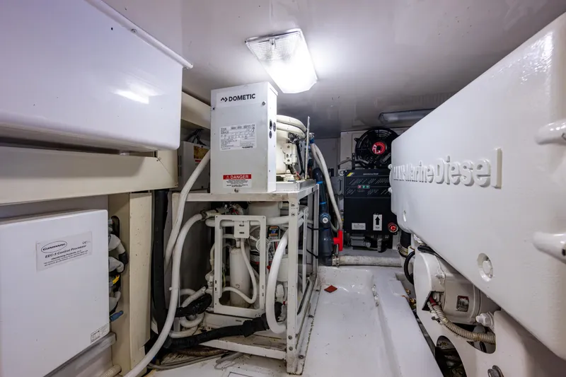 Slide: The Image of Engine room of 2004 Viking 48 Convertible yacht with marine diesel equipment. - 58
